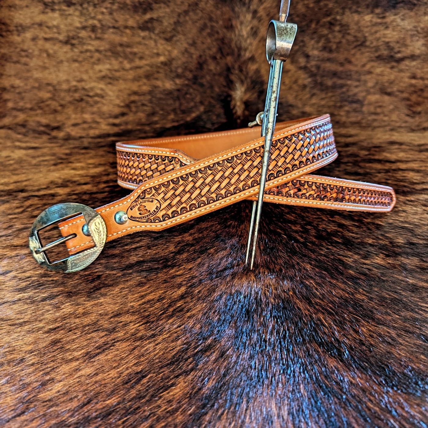 Basket-weave stamped leather belt on cowhide