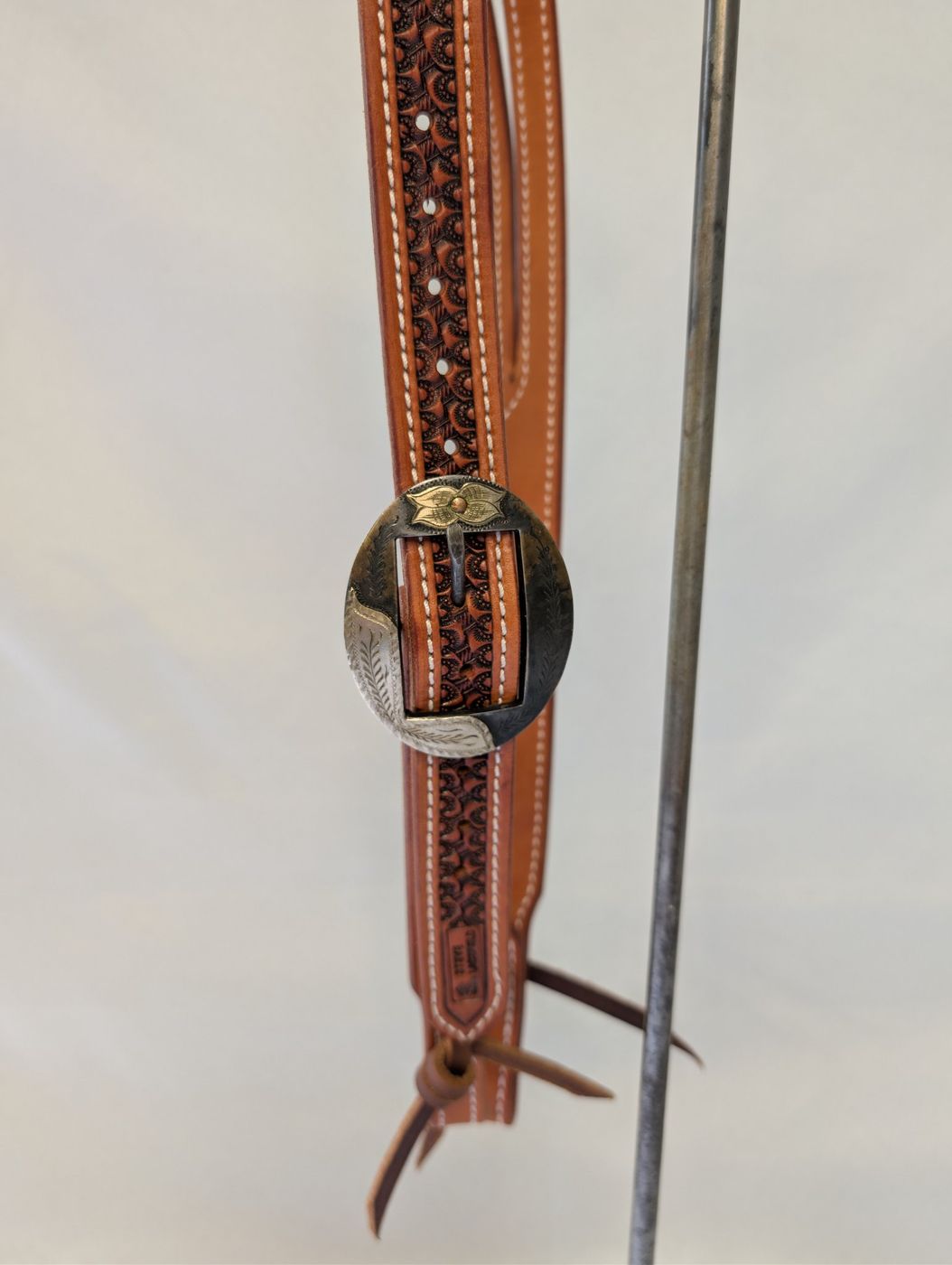 Headstall with basket-stamp cheek and engraved Stephen White buckle