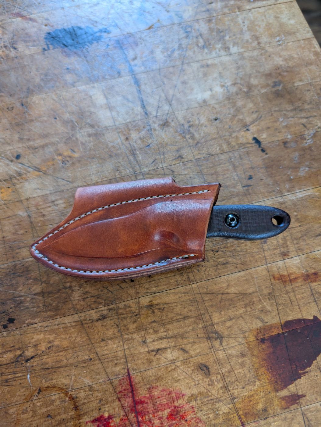 Hand-stitched brown leather knife sheath